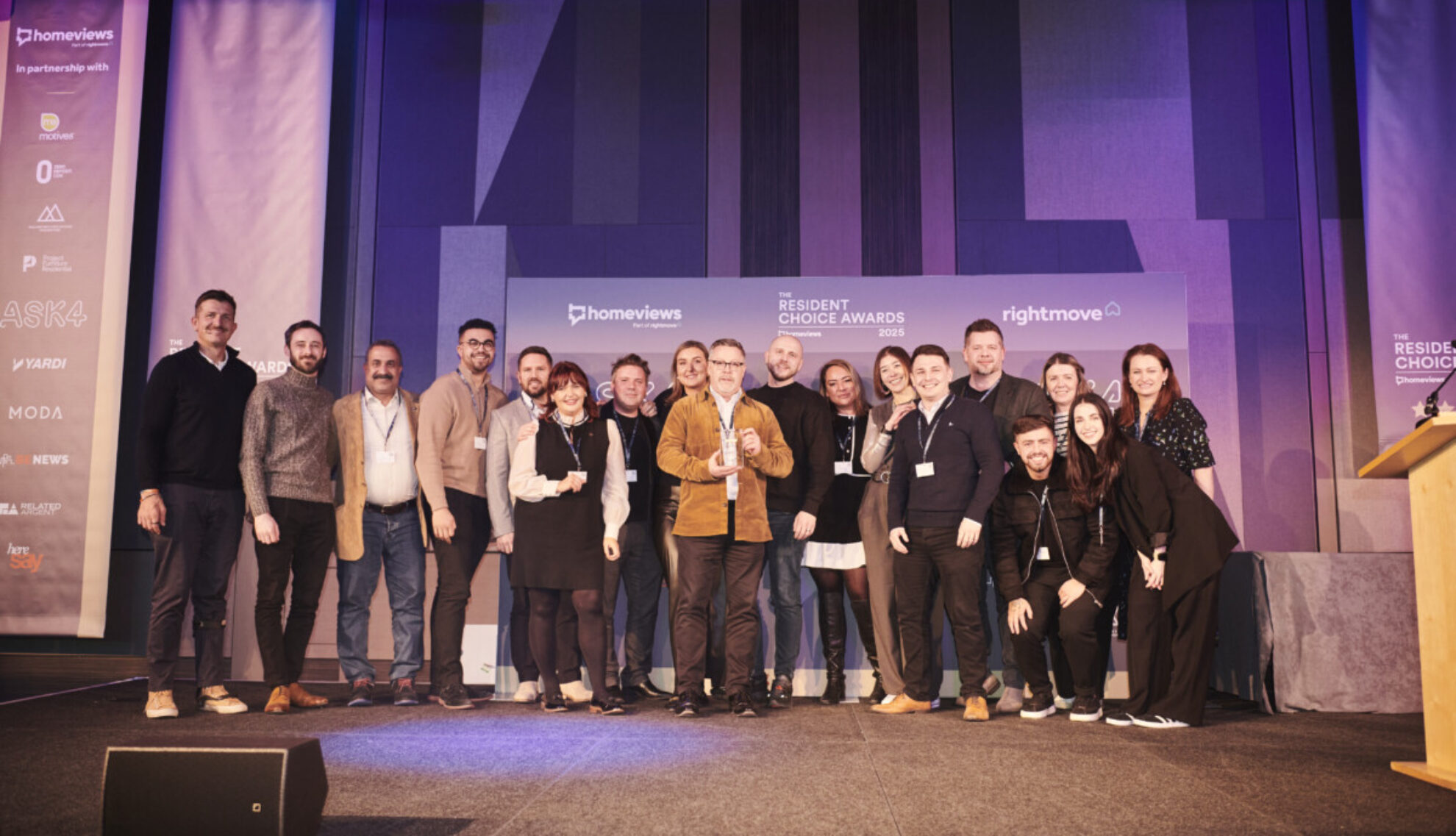 Moda-Living-award-win Moda Living team receive award on stage